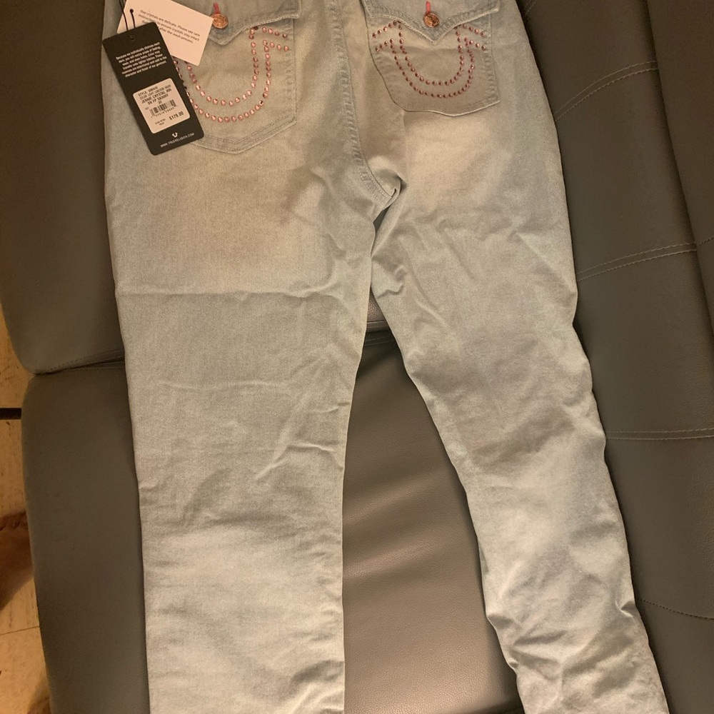 True Religion light blue jeans!!

With pink rhinestone detailing!